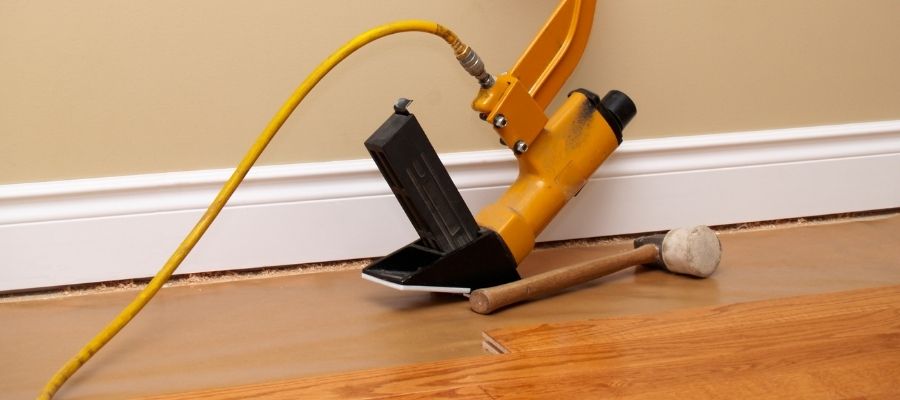 Hardwood floor being installed